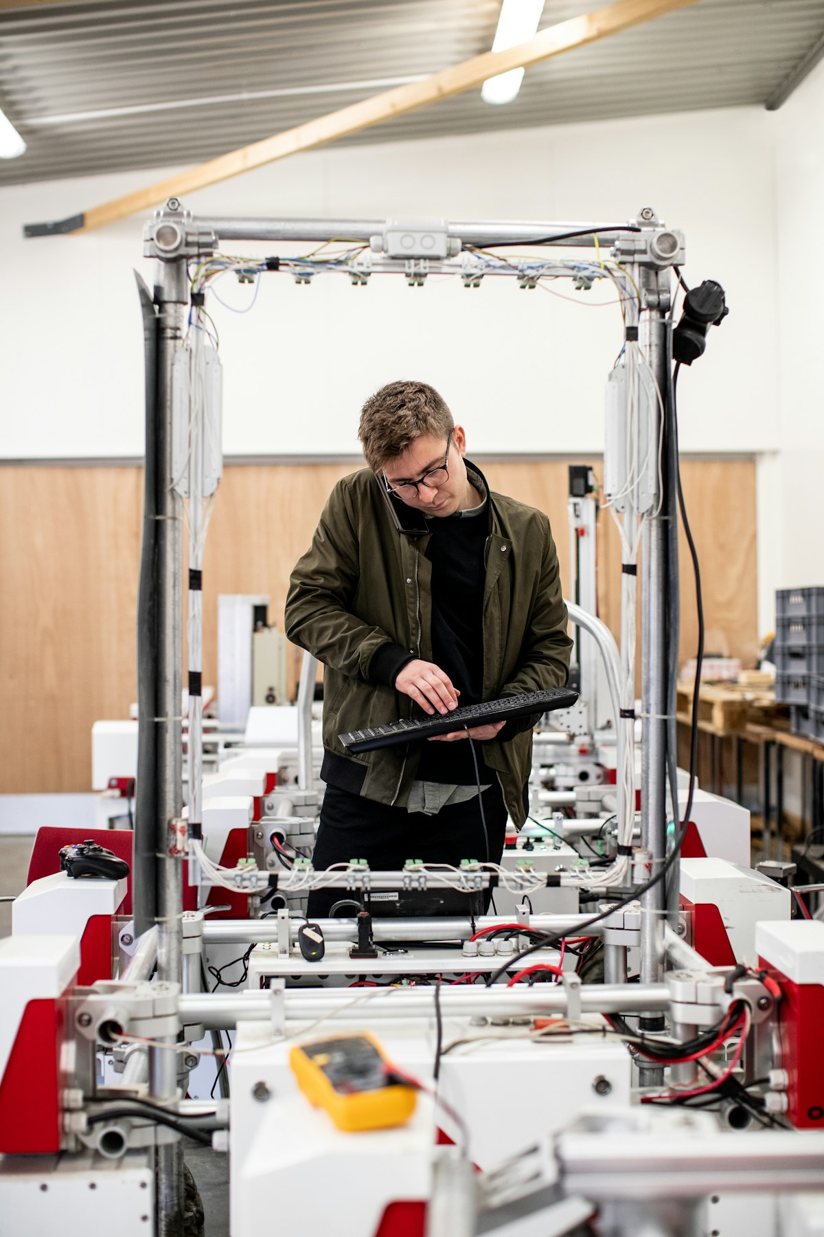 Inside an EMC testing chamber showing antennas and test equipment